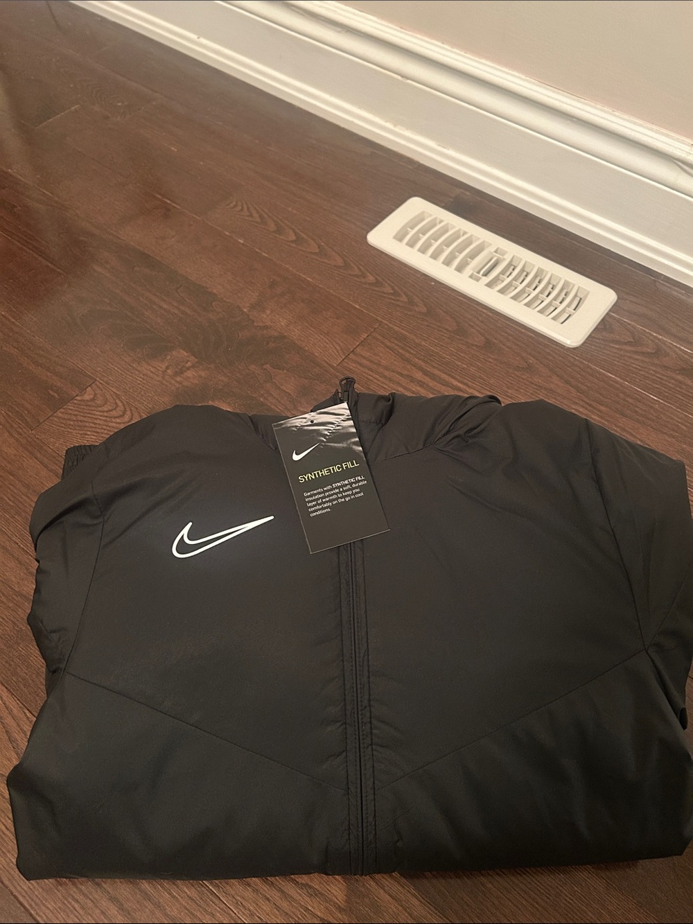 Nike Black Puffer Jacket with White Swoosh